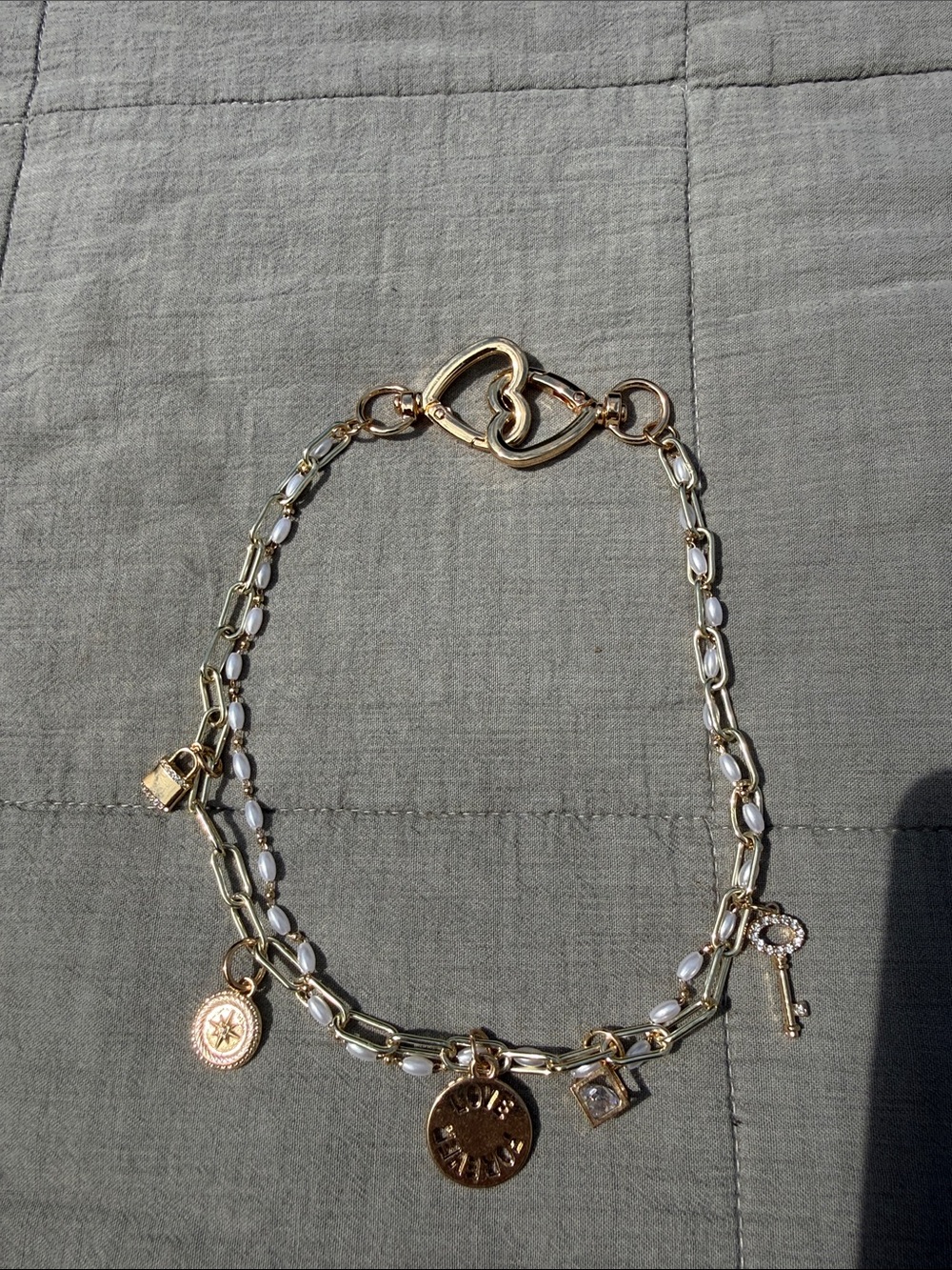 Gold-Tone Charm Necklace with Pearl-Trim and Heart Clasp